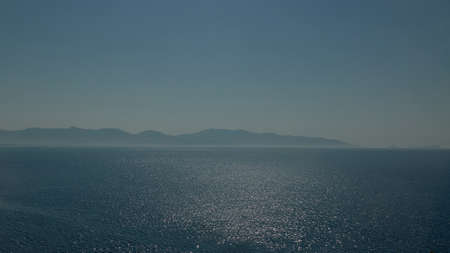 blue sea mountains and skyの写真素材