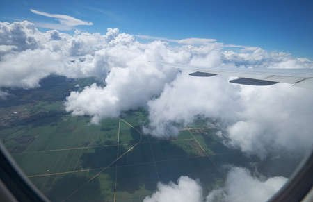high in the sky above the clouds