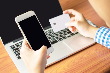 Asians are paying by credit card.の写真素材