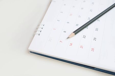 A pencil on the calendar With selectable focus for remark or memo.の写真素材