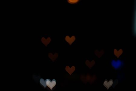 Heart shaped bokeh from night lights.