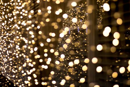 Orange bokeh, The focus of the orange light on a black background. Photos of abstract lighting.