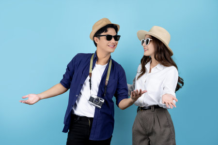 Happy and smiling Asian couple tourist in summer casual clothes. Vacation timeの写真素材