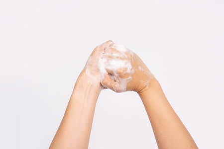 Hand cleaning, woman washing hands isolated on white background