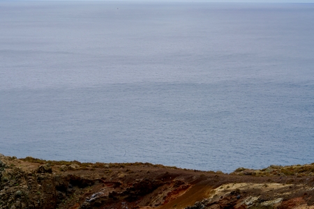 view from a volcanic cliff to the oceanのeditorial素材