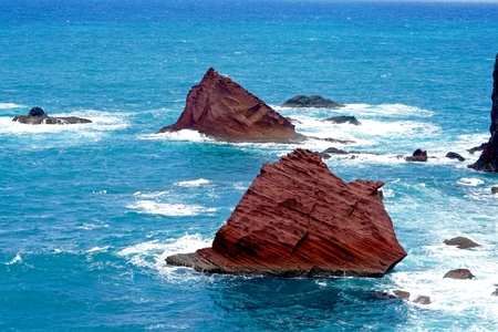 red rocks in the blue seaの写真素材