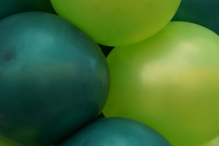 light and dark green balloonsの写真素材