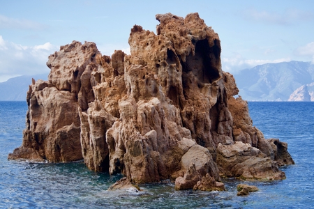 Wild rock formation in the oceanの写真素材
