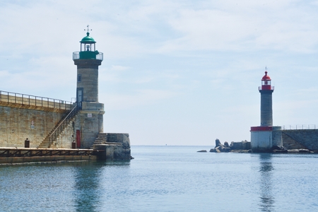 Two lighthouses, seen from the harborの写真素材