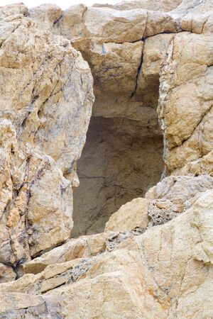 Open hole, a big stone in frontの写真素材
