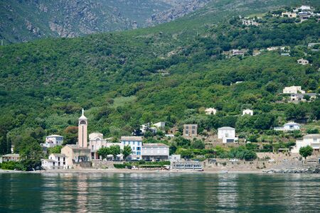 Coastline with an orange steeple, Maria on topの写真素材