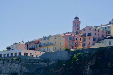 close-up of a historic harbour city around a steepleの写真素材