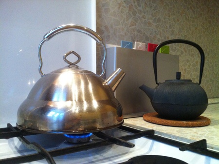 Blue Russian gaz flame boiling a kettle for tea in Ukraineの素材