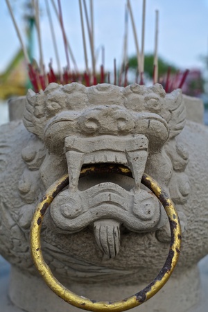 The stucco joss stick pot in the joss house.の写真素材