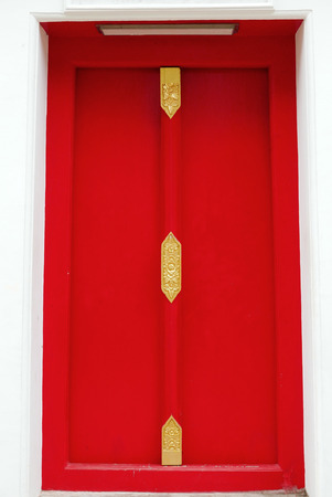 Thai door art architecture in  Wat Phra Chetupon Vimolmangklararm (Wat Pho) temple in Thailand.の写真素材