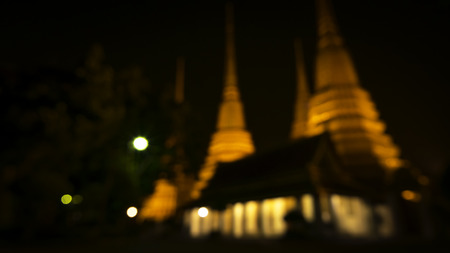 Bokeh image style of  lighting in  Thai art architecture in Wat Phra Chetupon Vimolmangklararm (Wat Pho) temple in Thailand.の写真素材