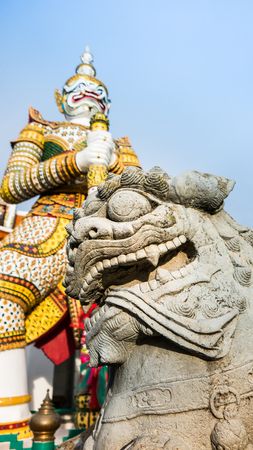 Bangkok - Thailand: The beautiful of  stone Thai-Chinese style sculpture and thai art architecture in Wat Arun buddhist temple in Bangkok, Thailand/Selective focus.の写真素材
