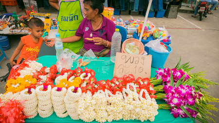BANGKOK THAILAND - SEPTEMBER 7 :Unidentified vender selling flower garland thai style local market at temple in Bangkok , Asia , Thailandのeditorial素材