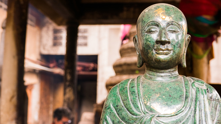 BANGKOK, THAILAND -September 9, 2015: Stone green of Face Buddha  Thai - Chinese style in Wat Leng Nei Yee Chinese temple in Yaowarat road,Bangkok capital city,Thailand.のeditorial素材