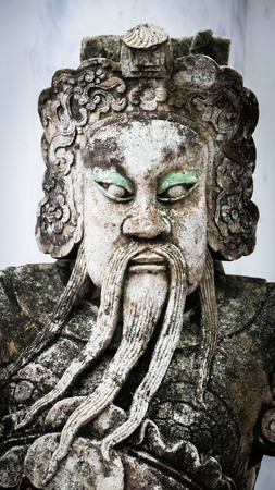 Nakhonpatom - Thailand , September 9 - 2016 :Stone Thai-Chinese style sculpture and thai art architecture in Wat Prapatomjedi temple in Bangkok, Thailand/ Selective focus.のeditorial素材