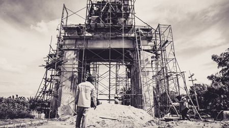 KANCHABURI, THAILAND - SEPTEMBER 24, 2016:Vintage B/W retro effect filtered hipster style image. Detail of Construction local site workers in Kanchanaburi ,Thailandのeditorial素材
