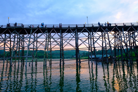 Kanchanaburi, Thailand - October 14, 2016: Old wooden bridge over the river (Mon Bridge) in Sangkhlaburi District, Kanchanaburi, Thailand. Photo taken on:14 October 2016のeditorial素材