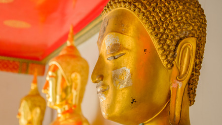 Bangkok, THAILAND - November 2, 2016 : Face of Golden buddha in hall, Wat Phra Chetupon...