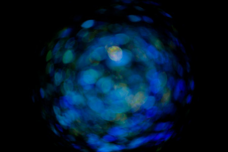 Abstract circular bokeh background blue lights.の写真素材