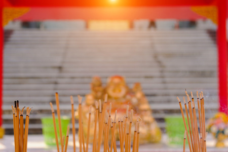 Incense burning at a temple in Wat Mangkon Kamalawat, Bangkokの写真素材