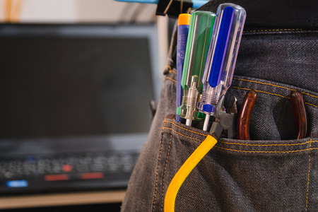 Set of engineer hand tools in jeans, A jeans with engineer constructor tools. Several engineer constructor tools on a denim workers.の写真素材