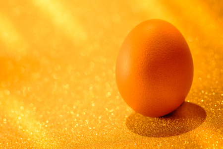 Fresh Eggs on golden light of golden bokeh background.  Golden heaven light Hope and success concept.の写真素材