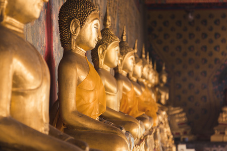 Row of golden buddha statue at Wat Arun, Bangkok Thailand. Landmark of Thailand and asia.のeditorial素材
