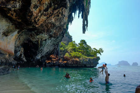 KRABI, THAILAND - December 16, 2017 : Tropical vacation holiday beach concept. tourist relaxing on Beautiful sea blue Railay beach, Krabi Thailand .のeditorial素材