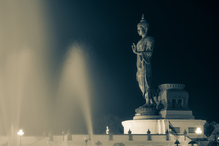 Important day in Buddha religion concept. Big buddha statue in the evening at Buddha park center in Nakorn prathom ,Thailand.の写真素材