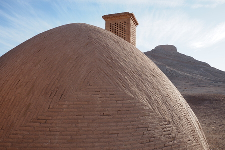 View to the Zoroastrian temples ruins and the Tower of Silence in Yazd, Iran.の写真素材