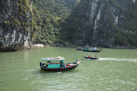 Boat in HALONG BAY, VIETNAM. Ha Long Bay is a UNESCO World Heritage Site in Vietnam.のeditorial素材