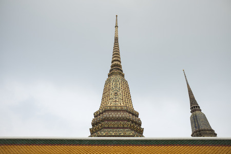 tower bangkok in the temple thailand abstract cross colors roof wat palaces asia sky and colors religion mosaic sculptureのeditorial素材