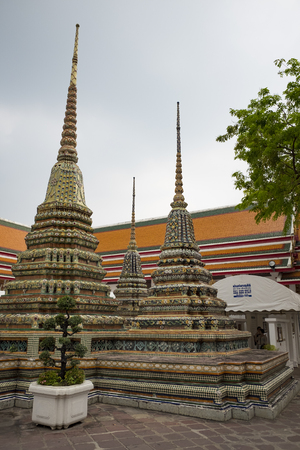 tower bangkok in the temple thailand abstract cross colors roof wat palaces asia sky and colors religion mosaic sculptureのeditorial素材