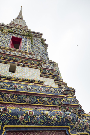 tower bangkok in the temple thailand abstract cross colors roof wat palaces asia sky and colors religion mosaic sculptureのeditorial素材