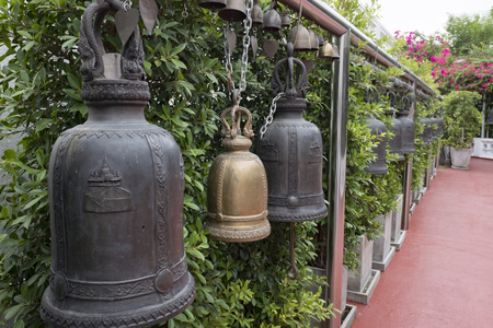 Bell ancient on the way of the Golden mount temple in the twilight of morning, Bangkok, Thailandの写真素材