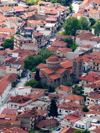 View of the red roofs of the Kalambaka town from the Meteora rocks, Greece.の写真素材