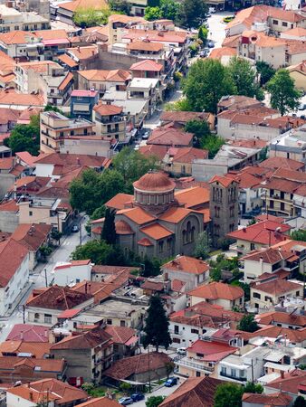 View of the red roofs of the Kalambaka town from the Meteora rocks, Greece.の写真素材