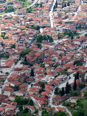 View of the red roofs of the Kalambaka town from the Meteora rocks, Greece.の写真素材