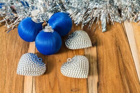 Blue decorated for Christmas and New Year. On the background of woodenの写真素材