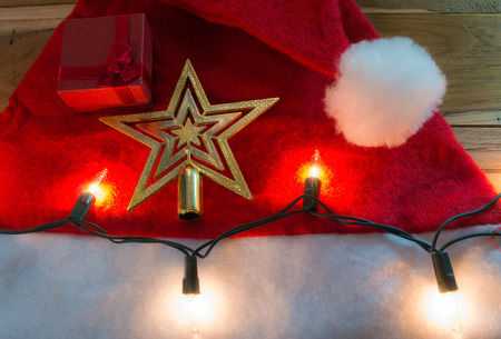 Christmas hat decorated for Christmas and New Year on a wooden floor.の写真素材