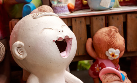 Smiling and laughing clay doll, Happy concept.の写真素材