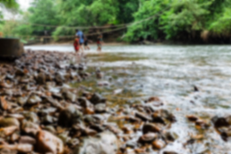 abstract blurred background of small stream and forest.の写真素材