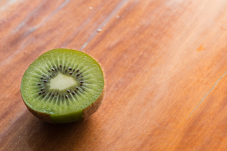 Kiwi fruit on wooden background.の写真素材