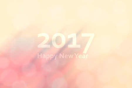 Happy new year 2017. Abstract background with motion blur and bokeh. retro, vintage and warm color...