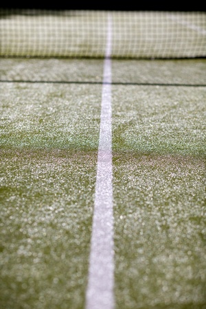 White lines on an astro turf tennis courtの写真素材